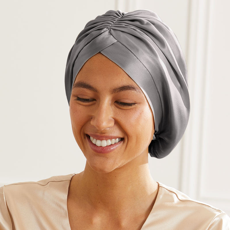 Silk turban Maison de la Soie in front of silver