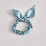 Fine light blue bow darling in mulberry silk 25 mommes